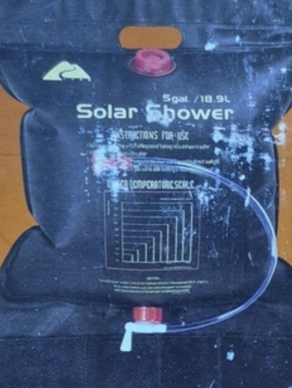 Ozark Trail Brown Solar Shower Pack with White Graphics